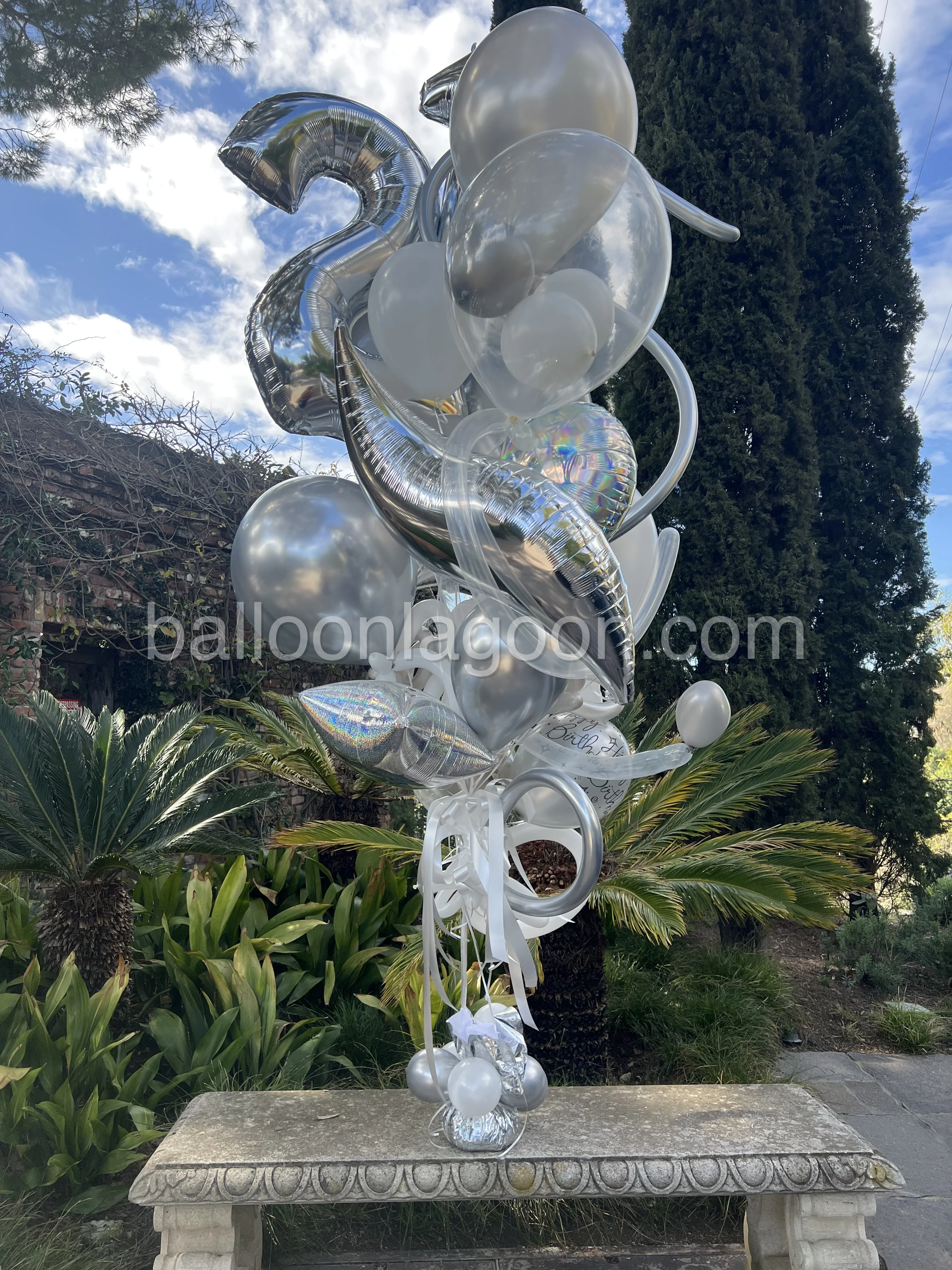 Silver foil birthday balloons in a Beverly Hills balloon bouquet