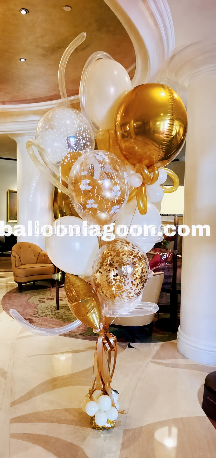 Elegant white and gold balloon bouquet for a Beverly Hills delivery