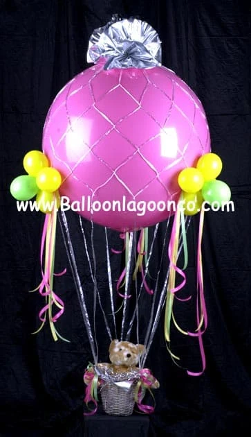 Up, Up & Away graduation balloon bouquet with ascending balloon pattern in school colors