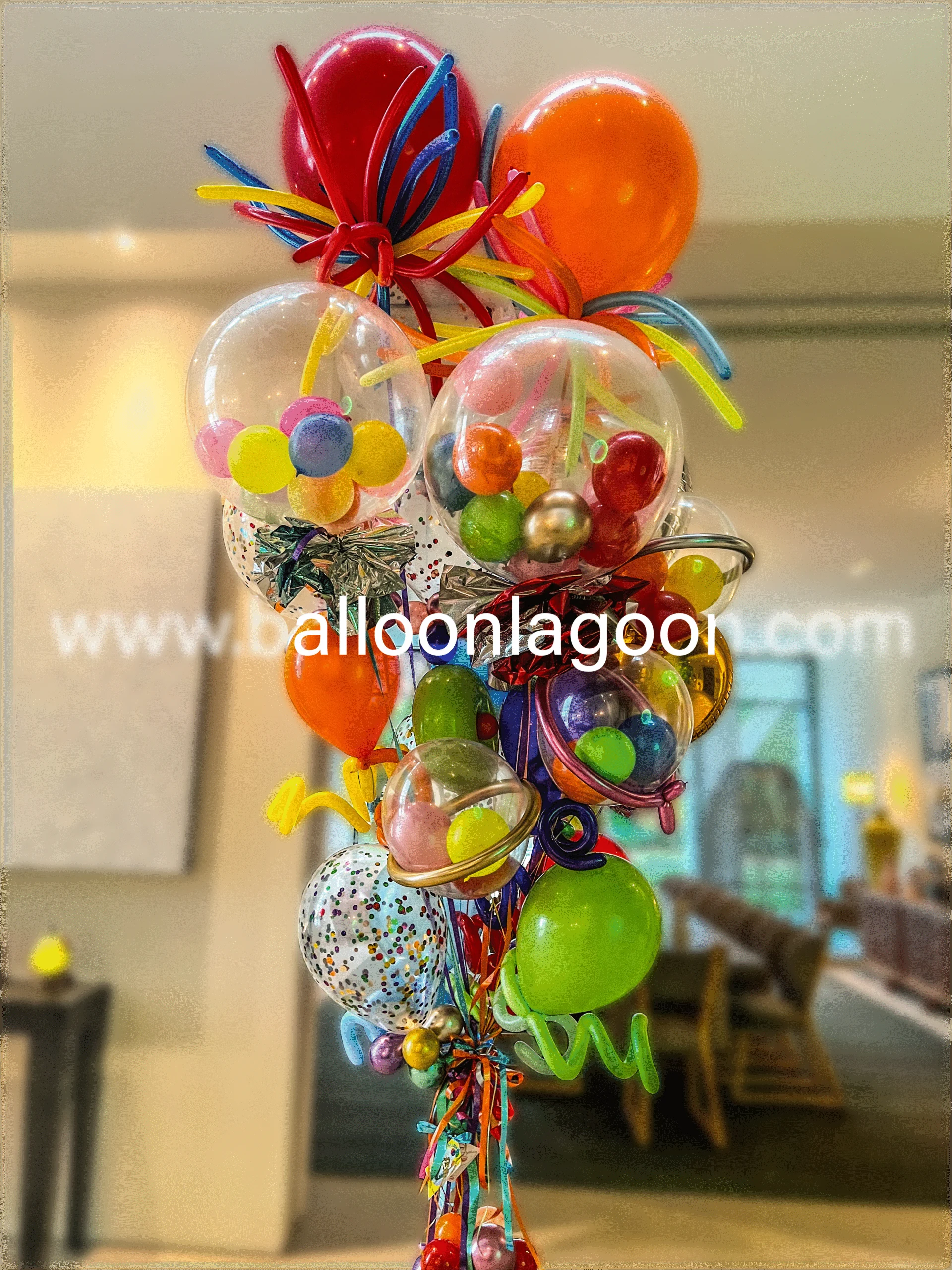 Professional summer balloon arrangement featuring vibrant colors, custom balloon decor by Beverly Hills balloon artist Balloon Lagoon